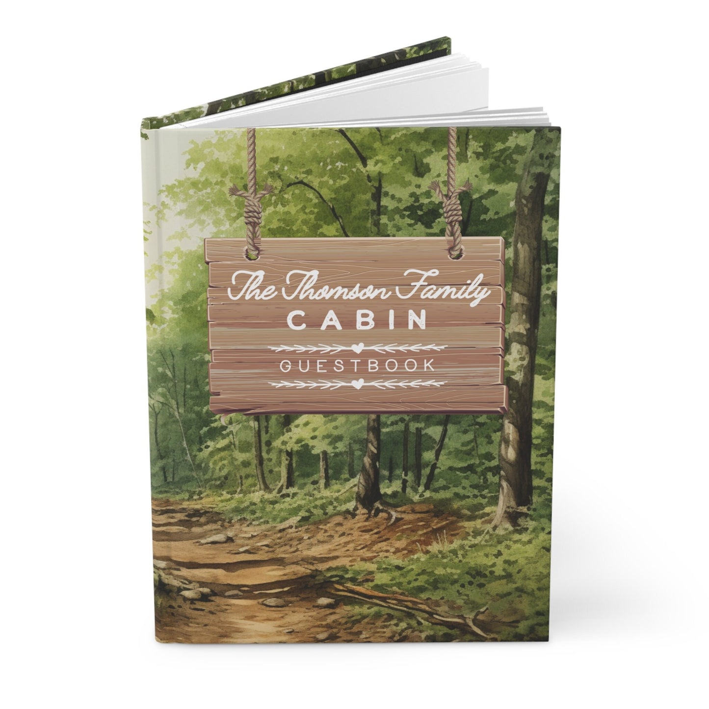 Custom Cabin Rental Guestbook. Rustic sign with text The Thomson Family Cabin Guestbook. Text can be personalized with family or cabin name. Watercolor forest painting in the background.